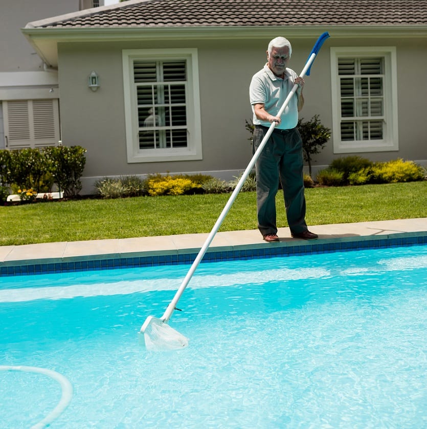 cleaning the bottom of the pool